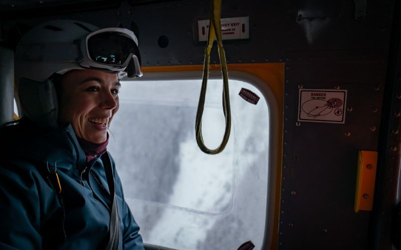 heli-skiing-canada-skier-in-helicopter-min (1)