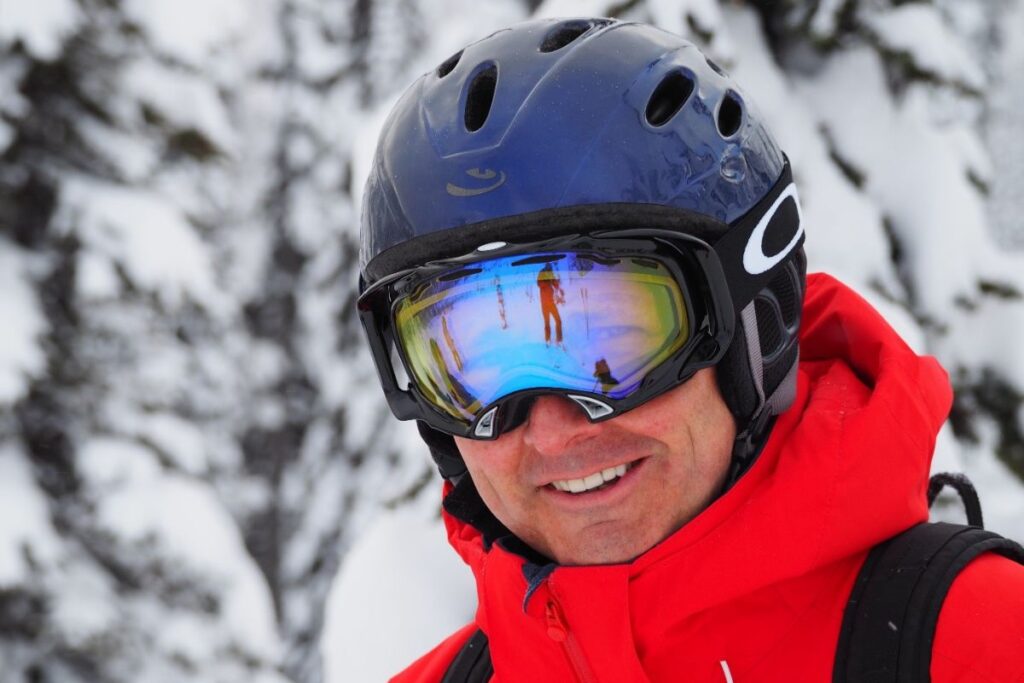 affordable-heli-skiing-smiling-man-min
